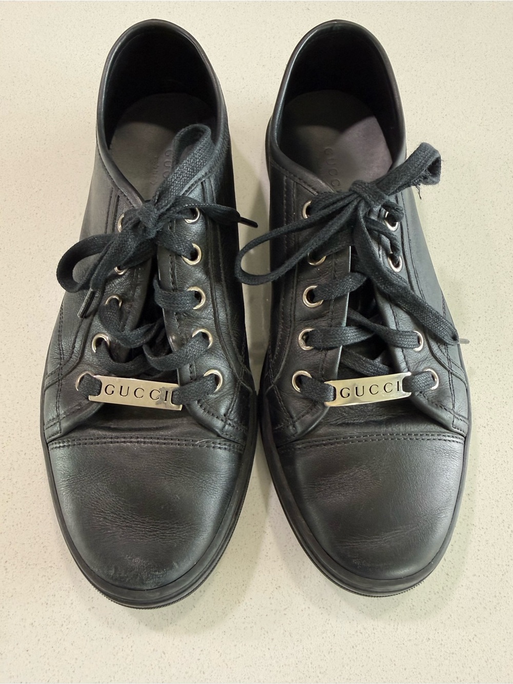 Gucci Black Leather Lace-Up Flats with Metal Logo Accent